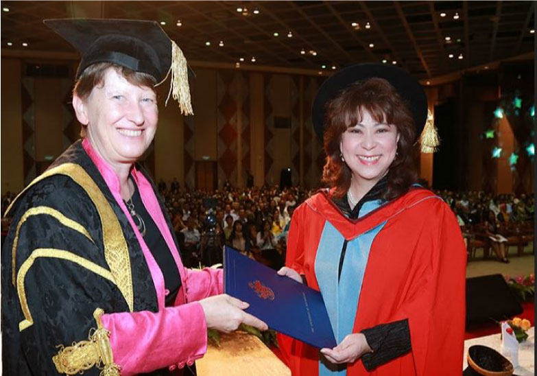 Elizabeth receiving Doctor of Laws (Honoris Causa) from Professor Christine Thelma OBE awarded by the University of Nottingham for her contributions to the growth of private Higher Education in Malaysia.